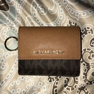 Micheal Kors mini, leather wallet.